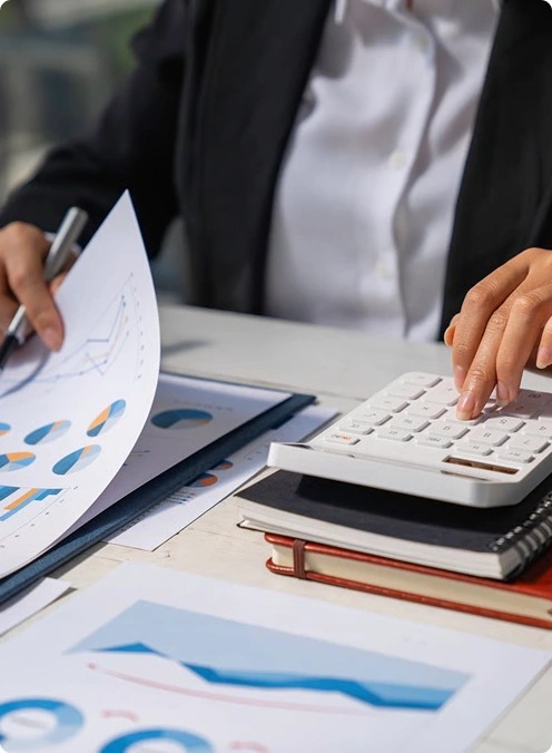 Reviewing financial charts and tax documents