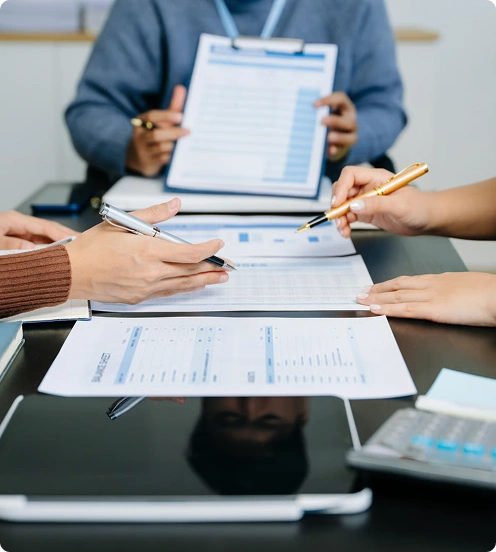 Reviewing financial charts and tax documents