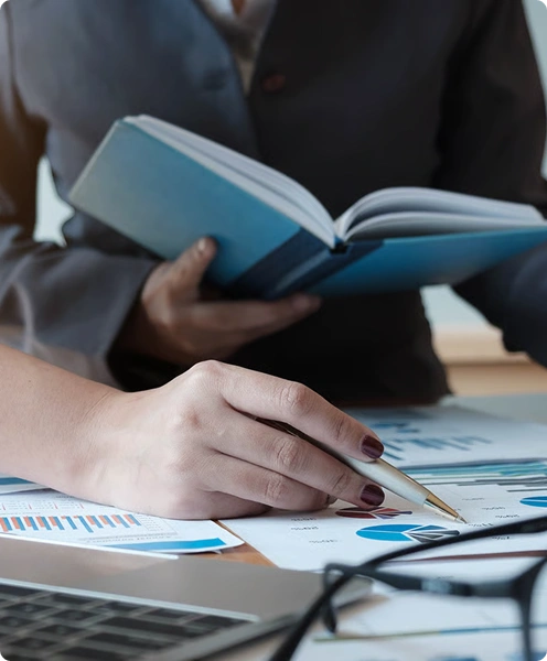 Reviewing financial charts and tax documents
